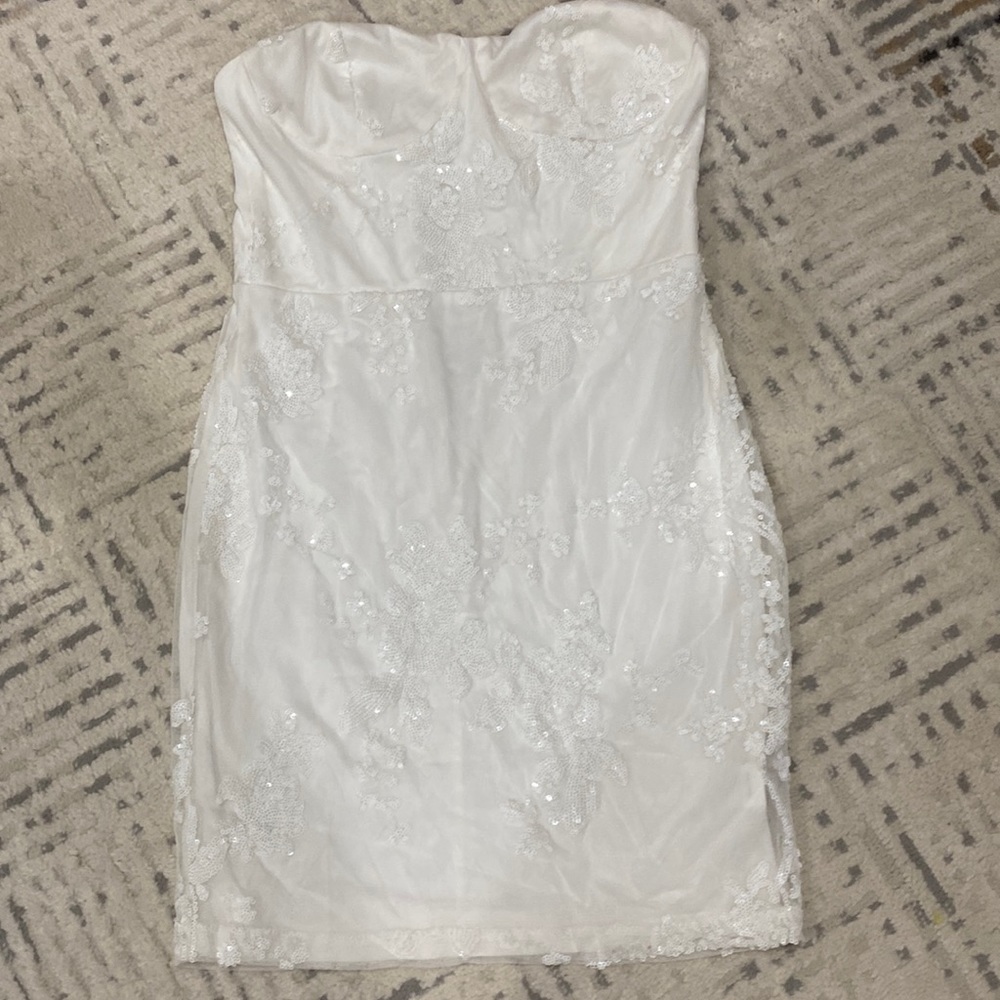 This beautiful strapless white dress would be great for a bachelorette party!